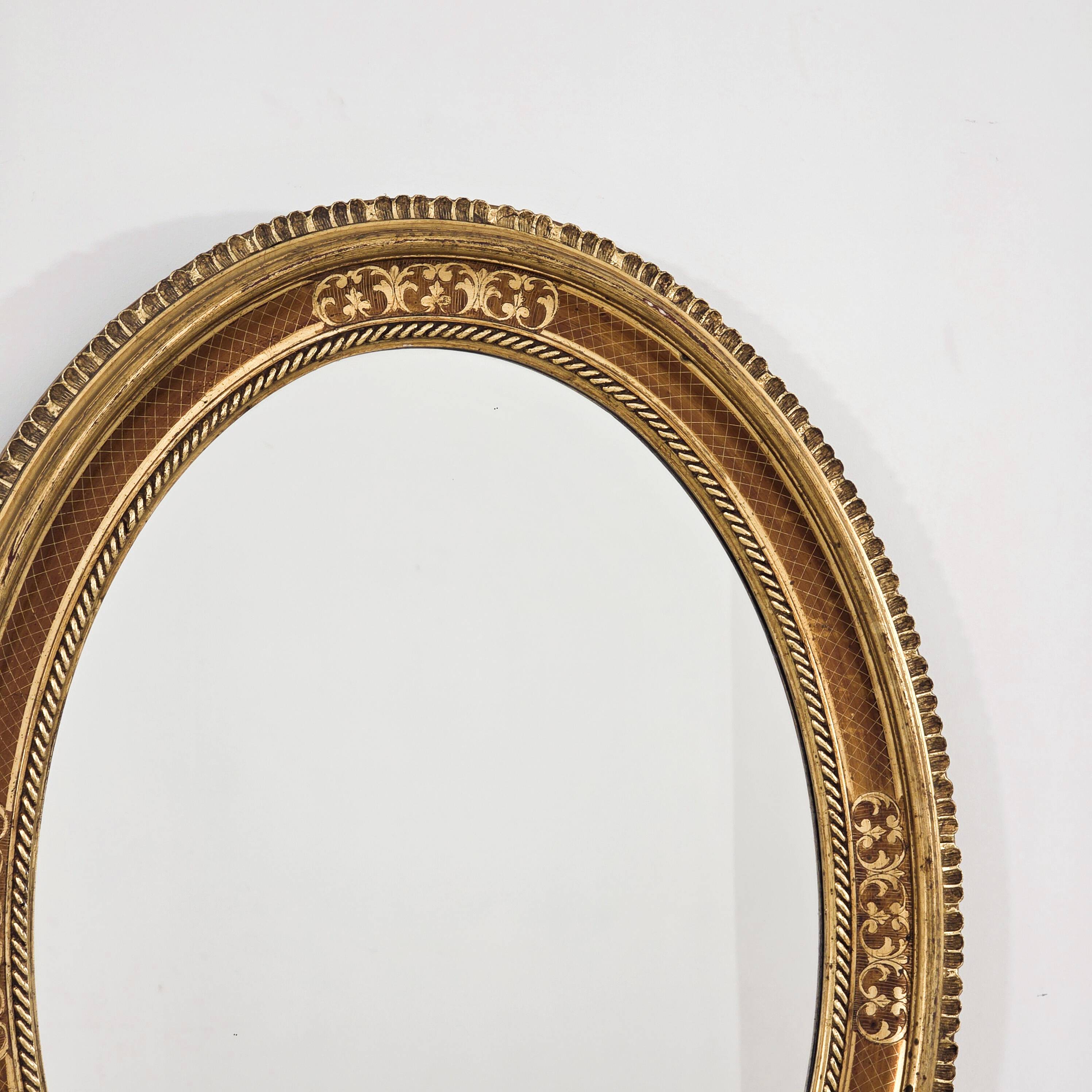 Paire de miroirs médaillon de style Louis XV