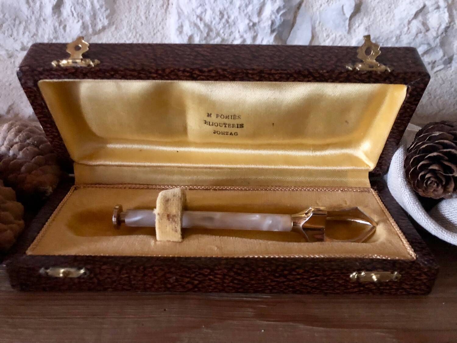 Sugar or ice tongs in their case