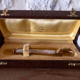 Sugar or ice tongs in their case