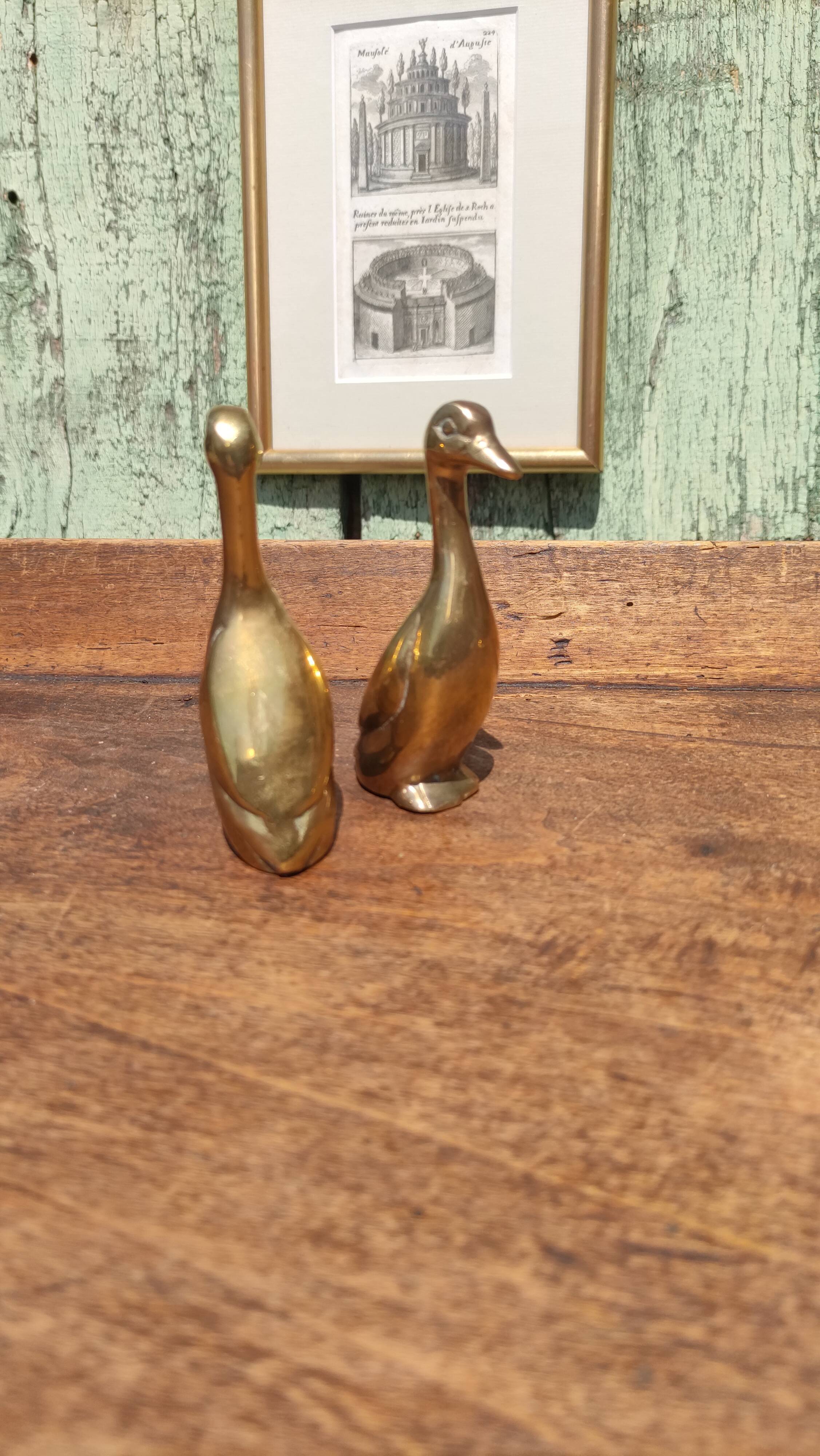 Pair of golden brass ducks