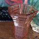 Vase en verre rose