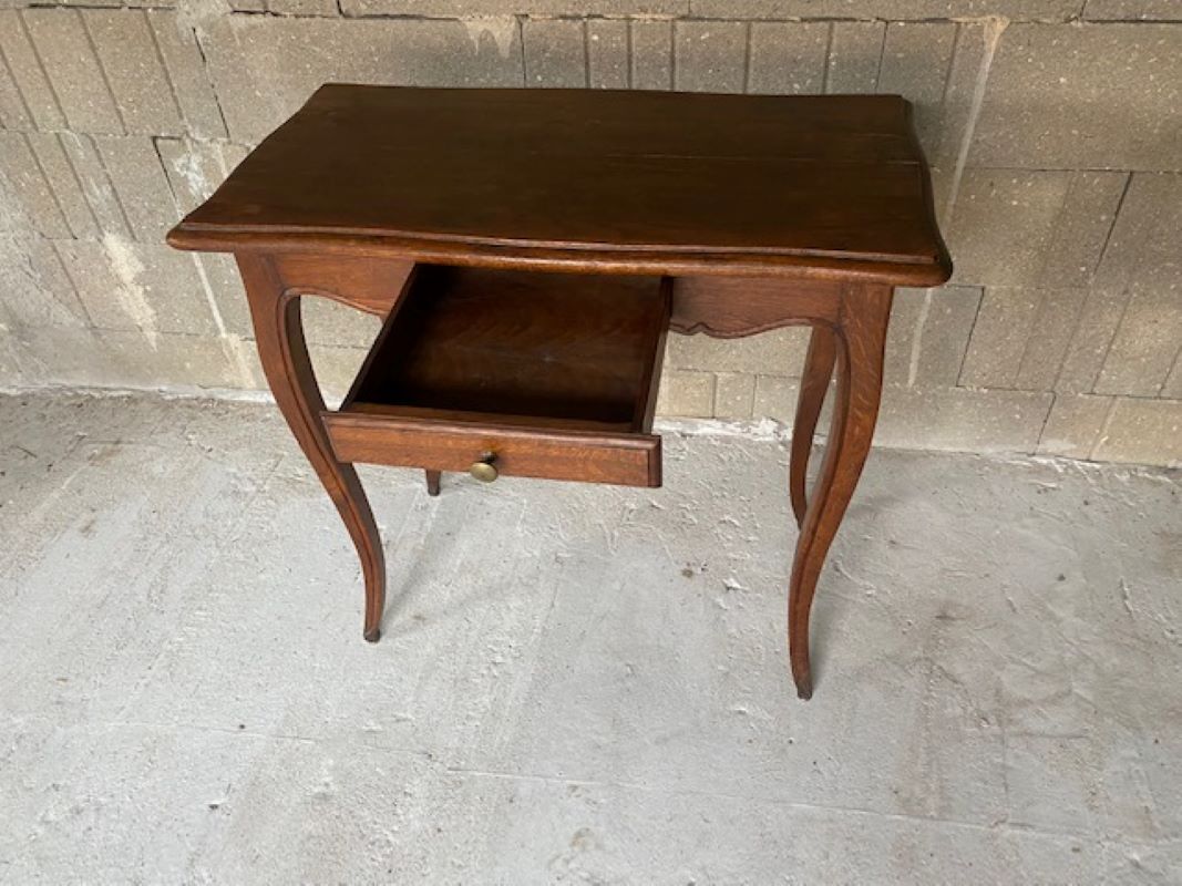 Solid oak desk with a Louis XV 1900 style drawer