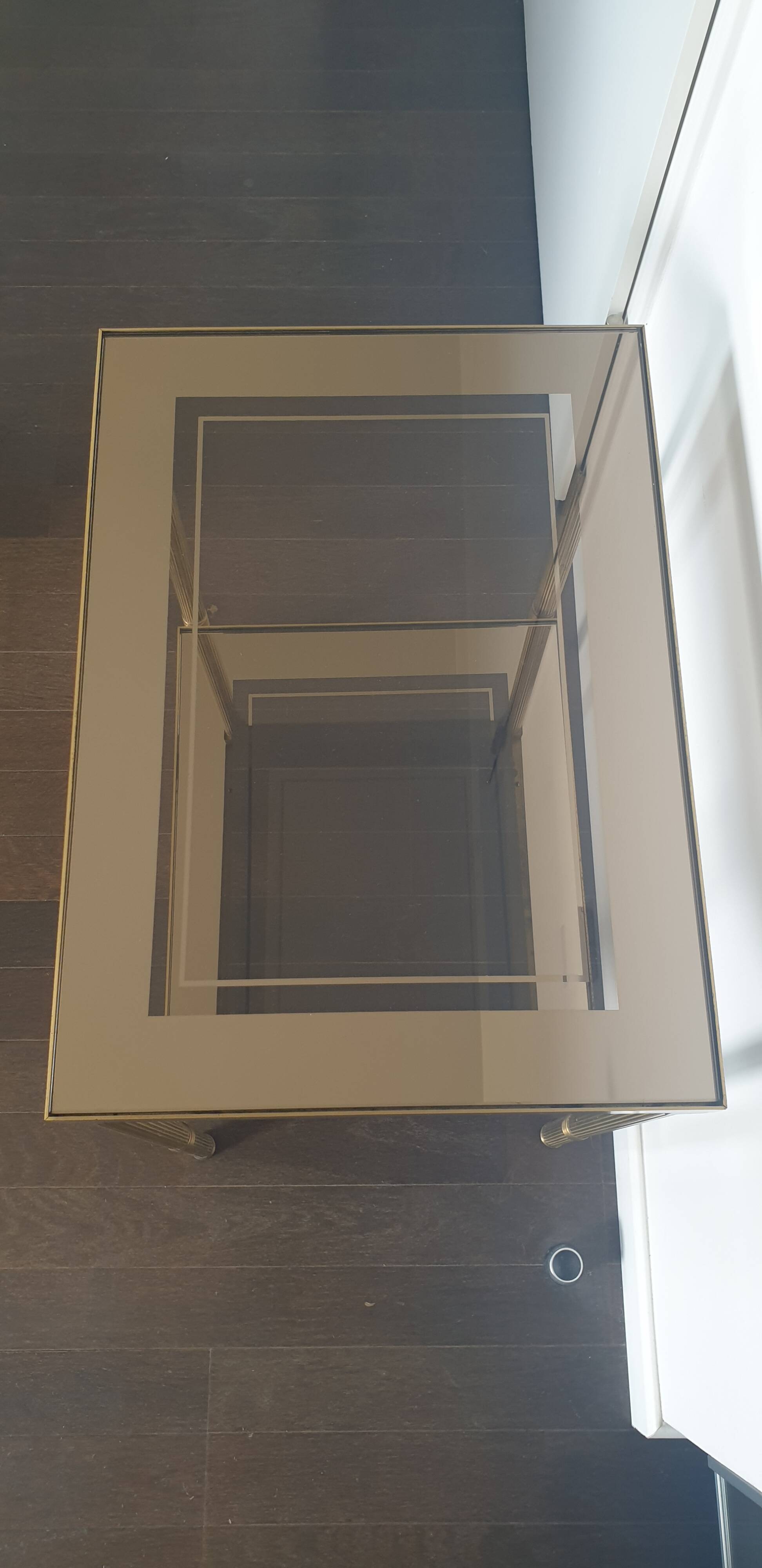 Double tray side table in brass and smoked glass.