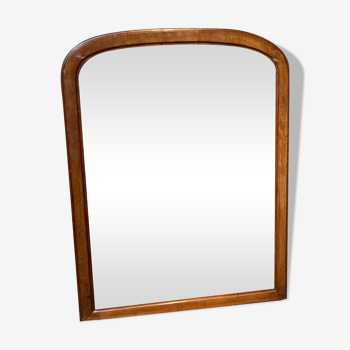 Rounded wooden mirror on top
