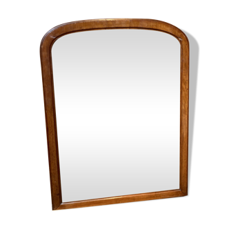 Rounded wooden mirror on top