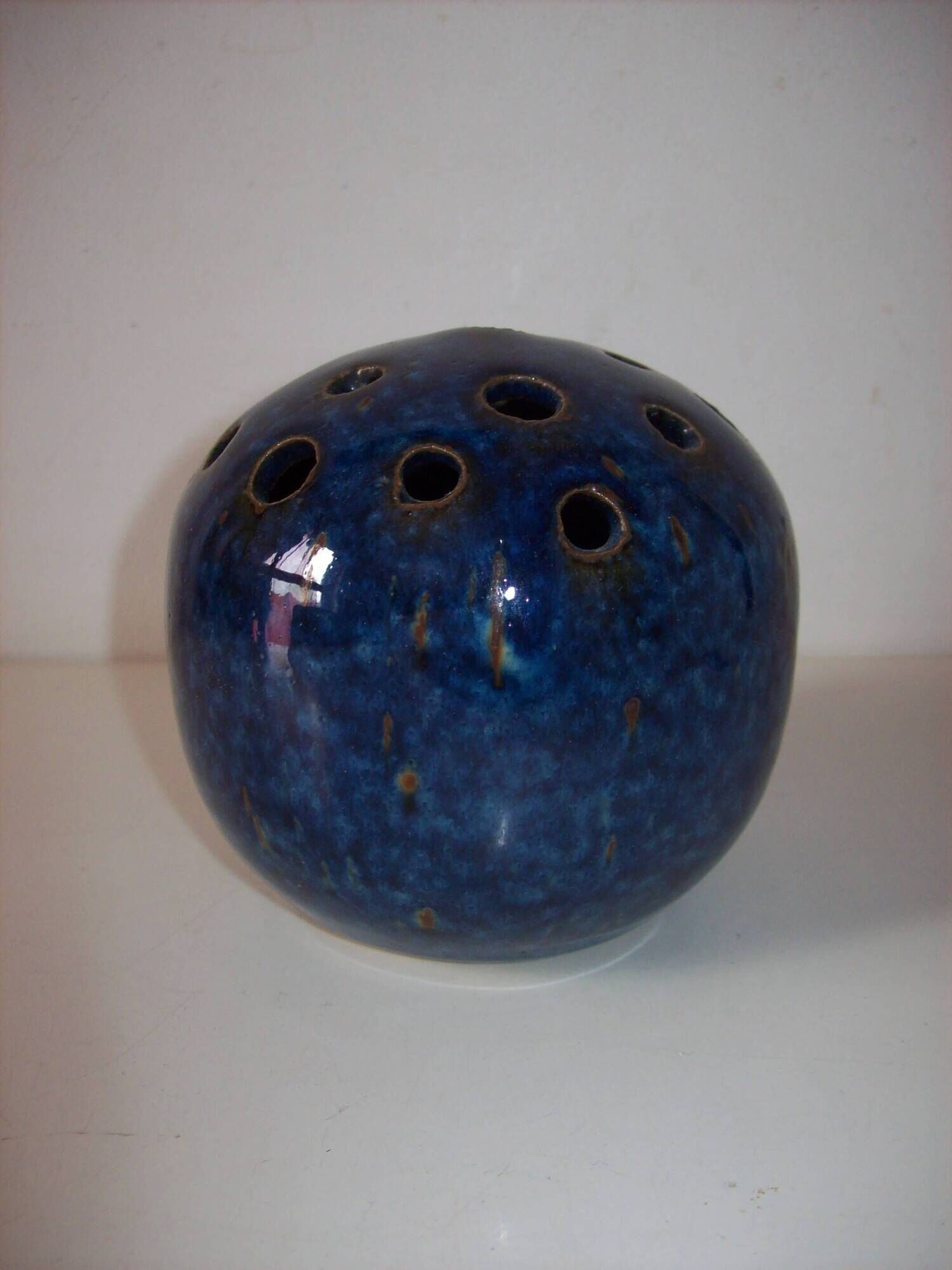 Ceramic blue flower pick