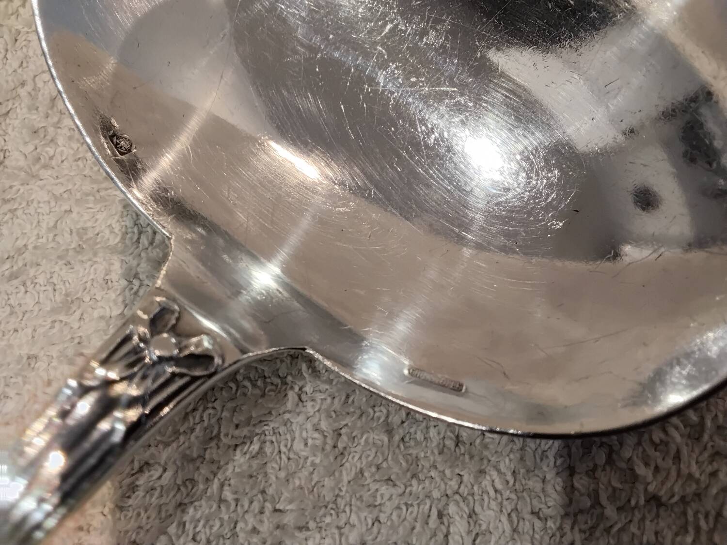 Silver-plated sauce spoon by Christofle silversmiths, Louis XVI ribbons