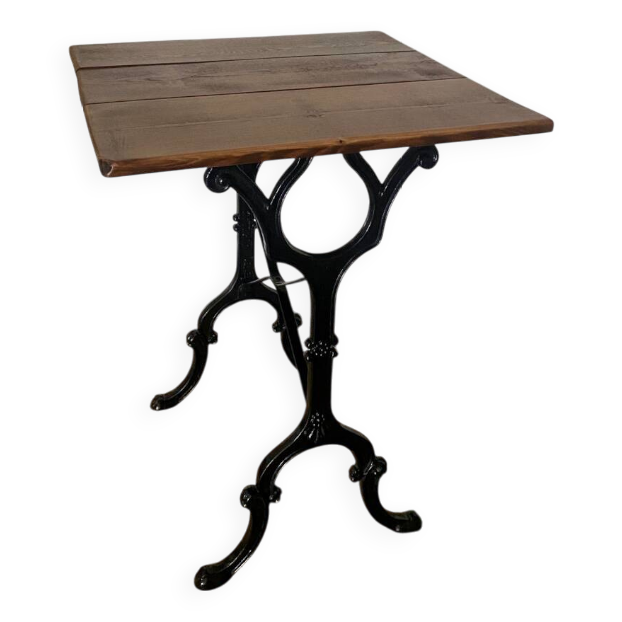 Bistro table with iron legs and raw wood top.
