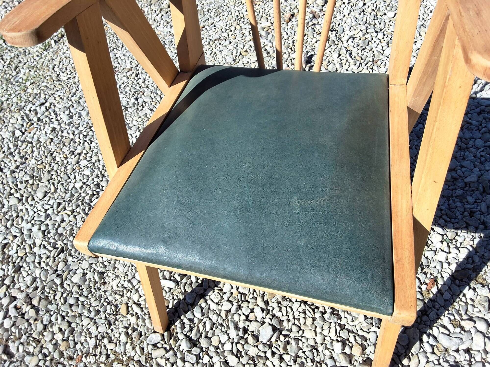 Compass leg armchair