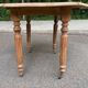 Renovated 18th century solid wood extendable round dining table with shutters
