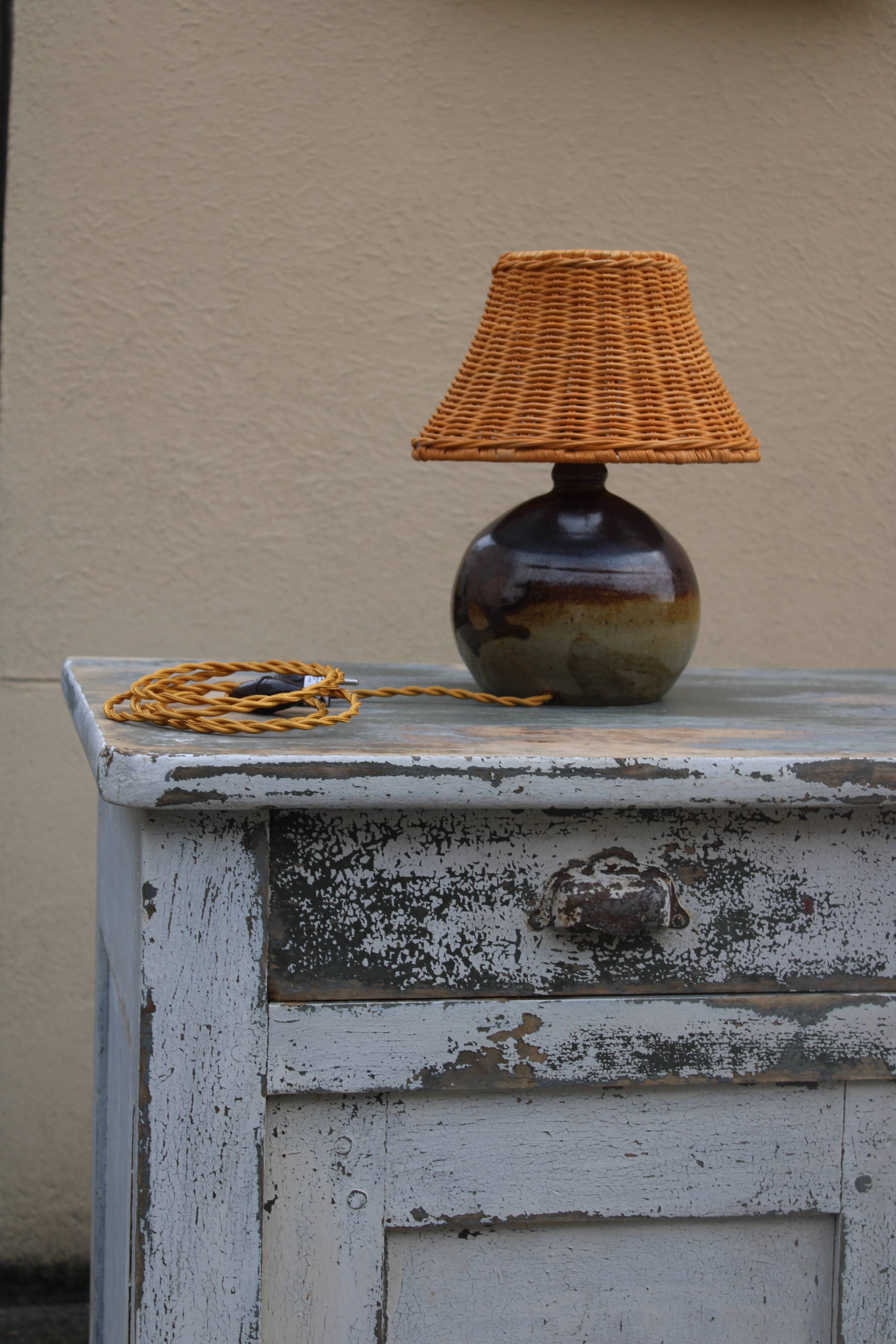 Vernified and rattan sandstone lamp
