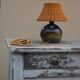 Vernified and rattan sandstone lamp