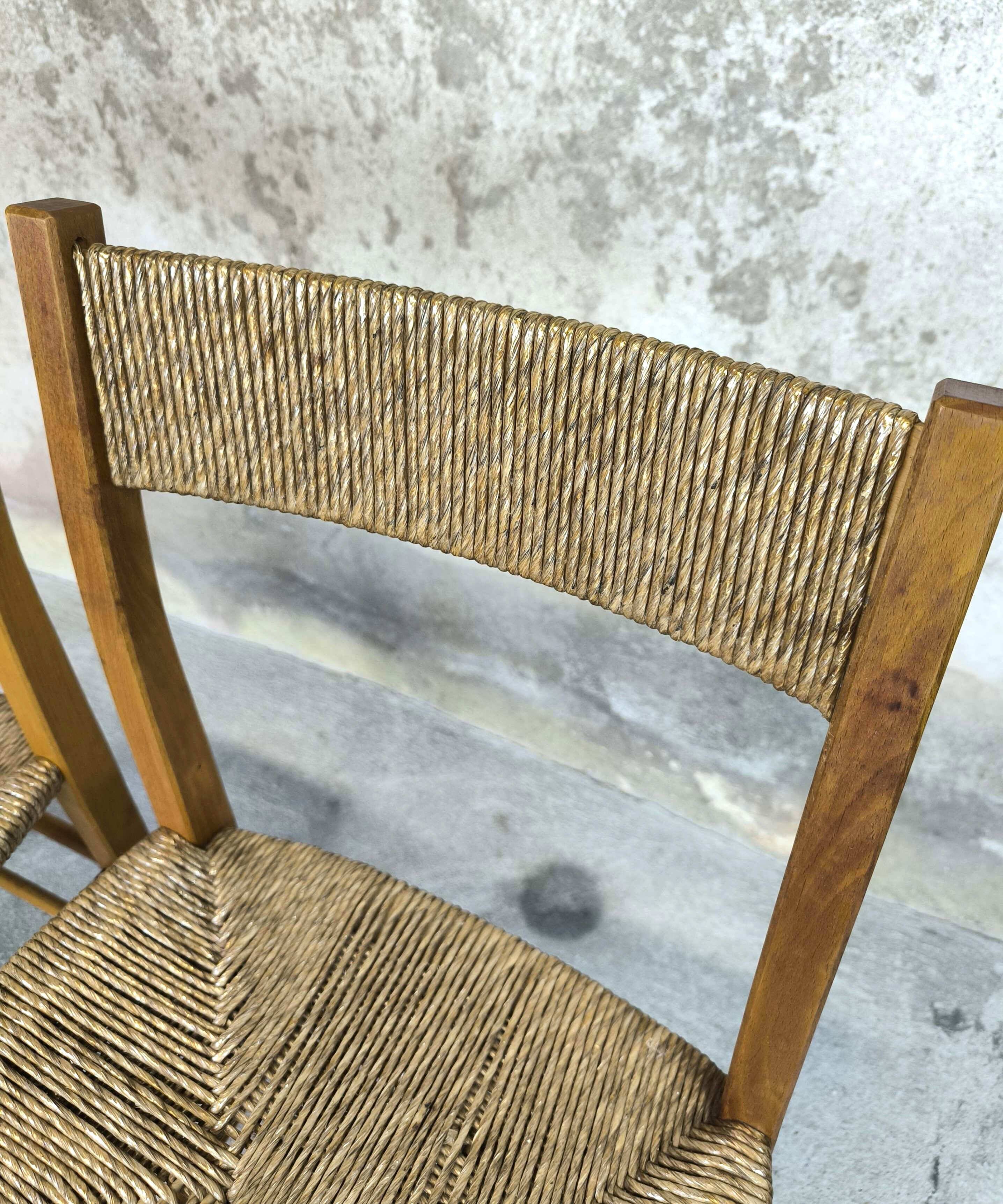 Pair of vintage wood and straw chairs