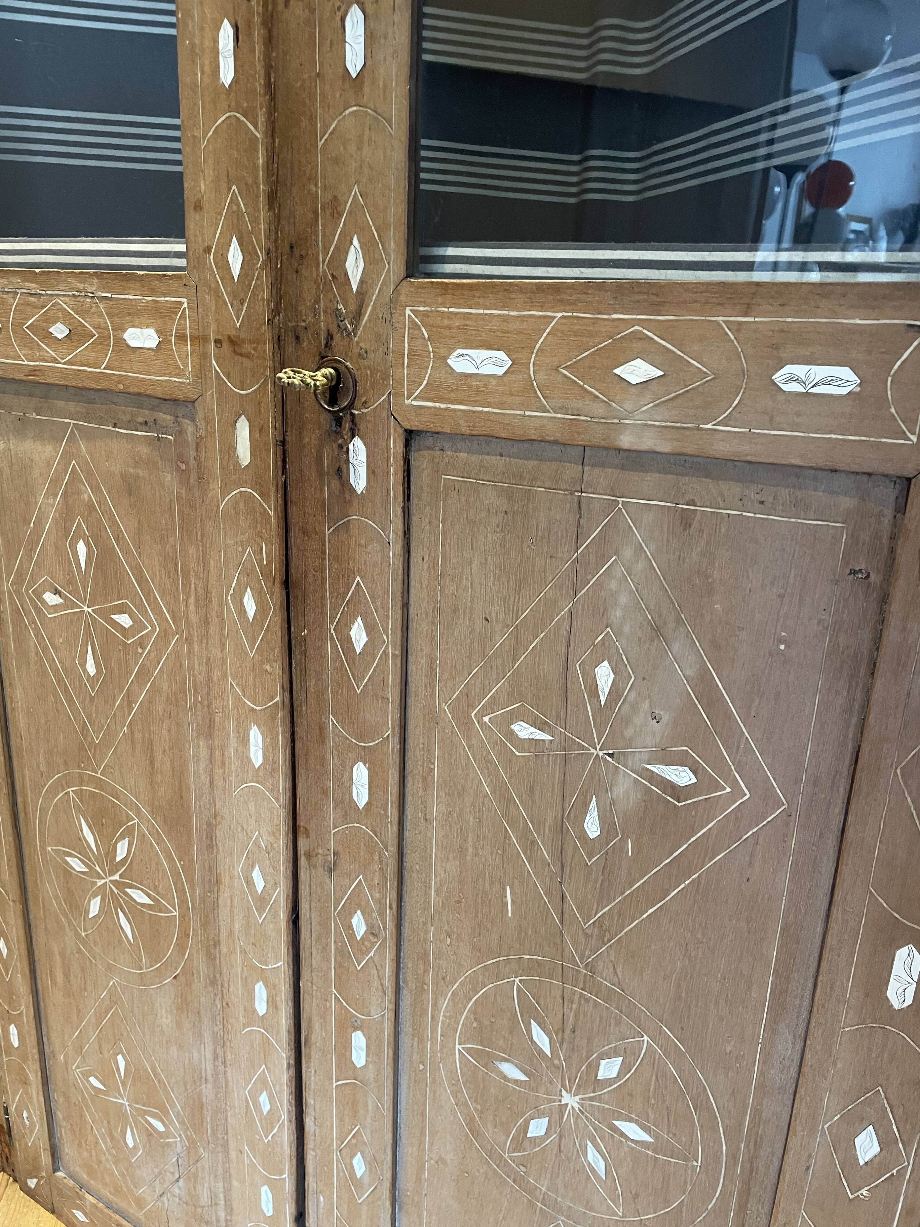 Oriental corner cabinet