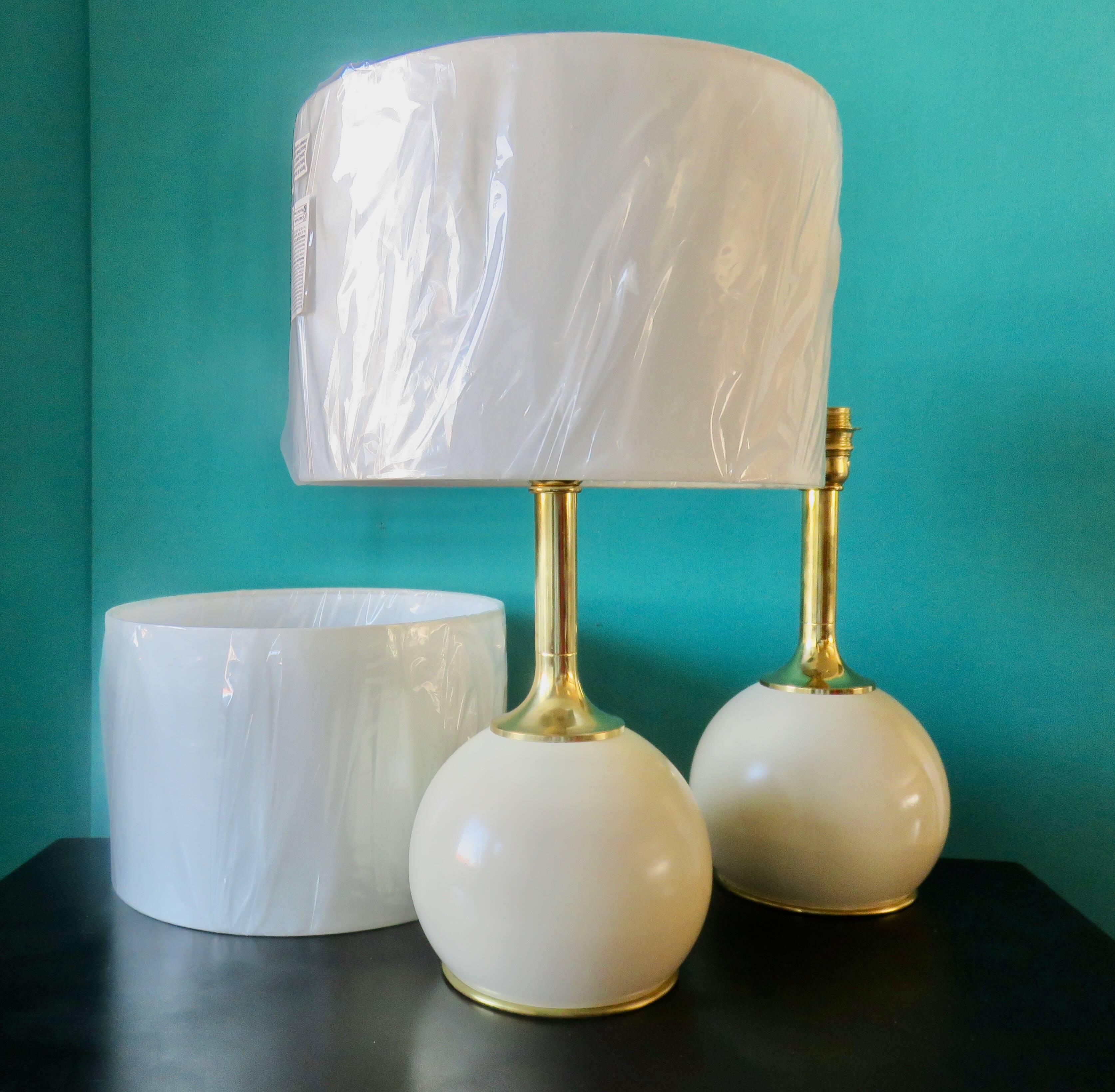 Pair of bedside lamps in brass and ecru lacquered metal, Denmark 1960
