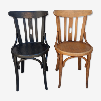 Duo of wooden bistro chairs