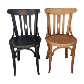 Duo of wooden bistro chairs