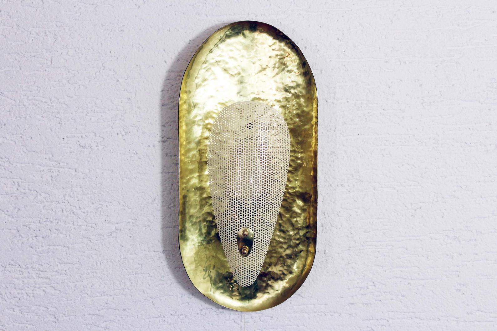 Hammered brass and perforated metal sconce