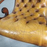 Pair of padded Chesterfield armchairs