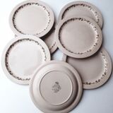 Set of 7 Betty Longwy model plates with floral decoration