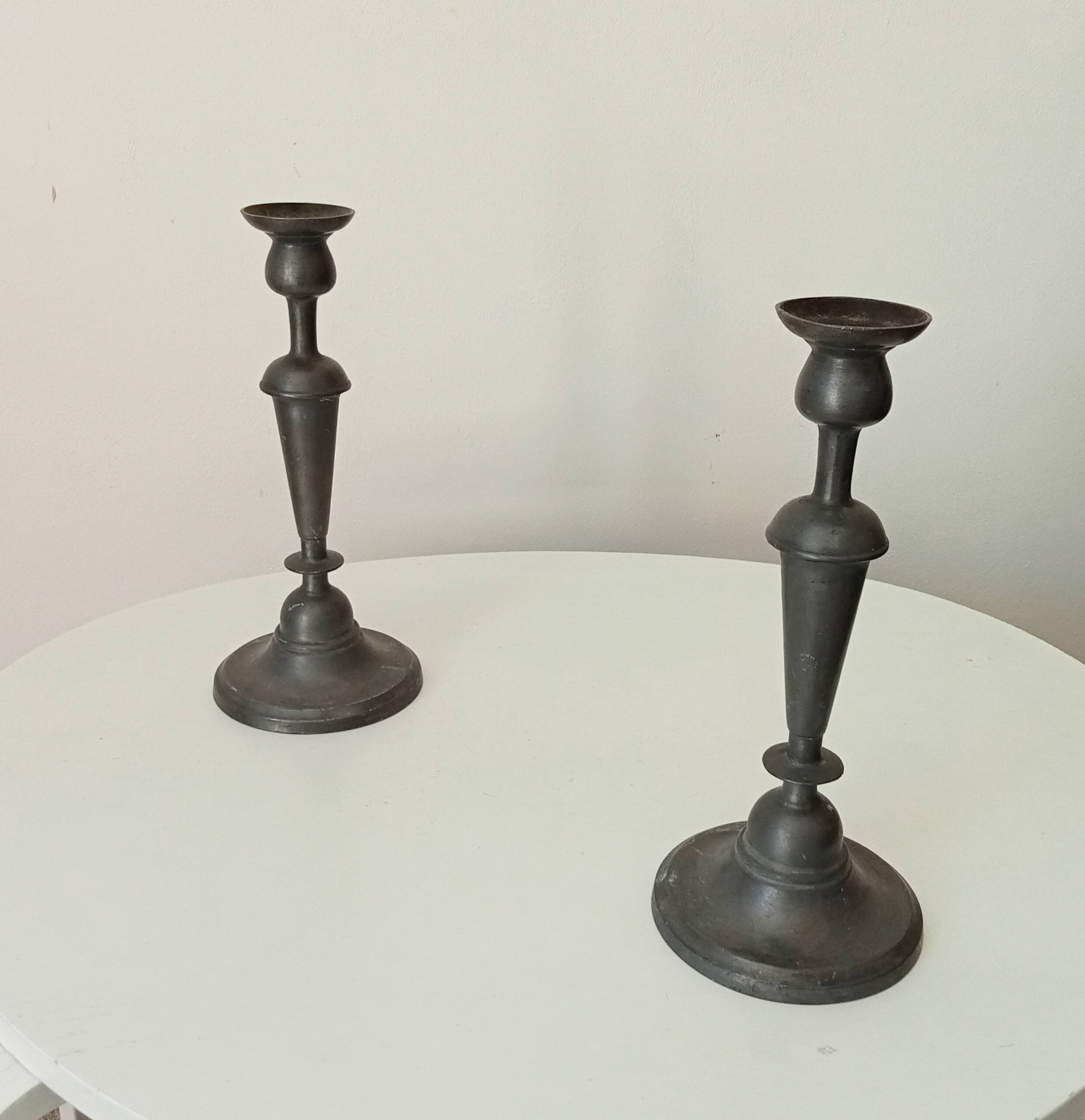 Pair of large old candlesticks in solid pewter