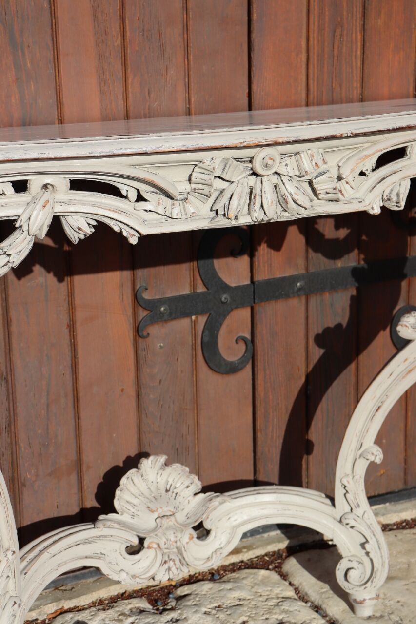 Carved wooden console