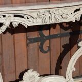 Carved wooden console