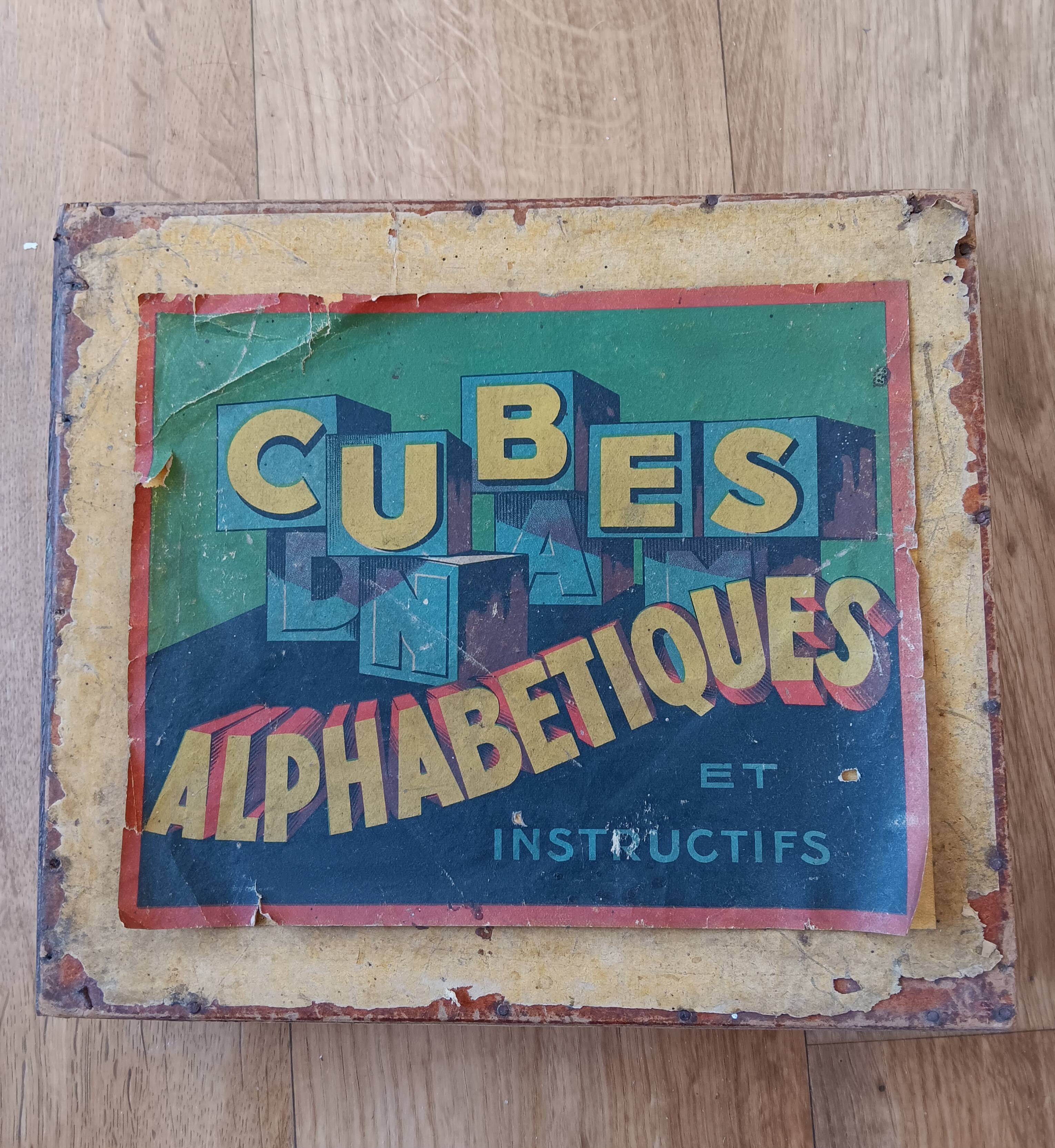 Instructional alphabetical cubes from the early 20th century.