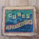 Instructional alphabetical cubes from the early 20th century.