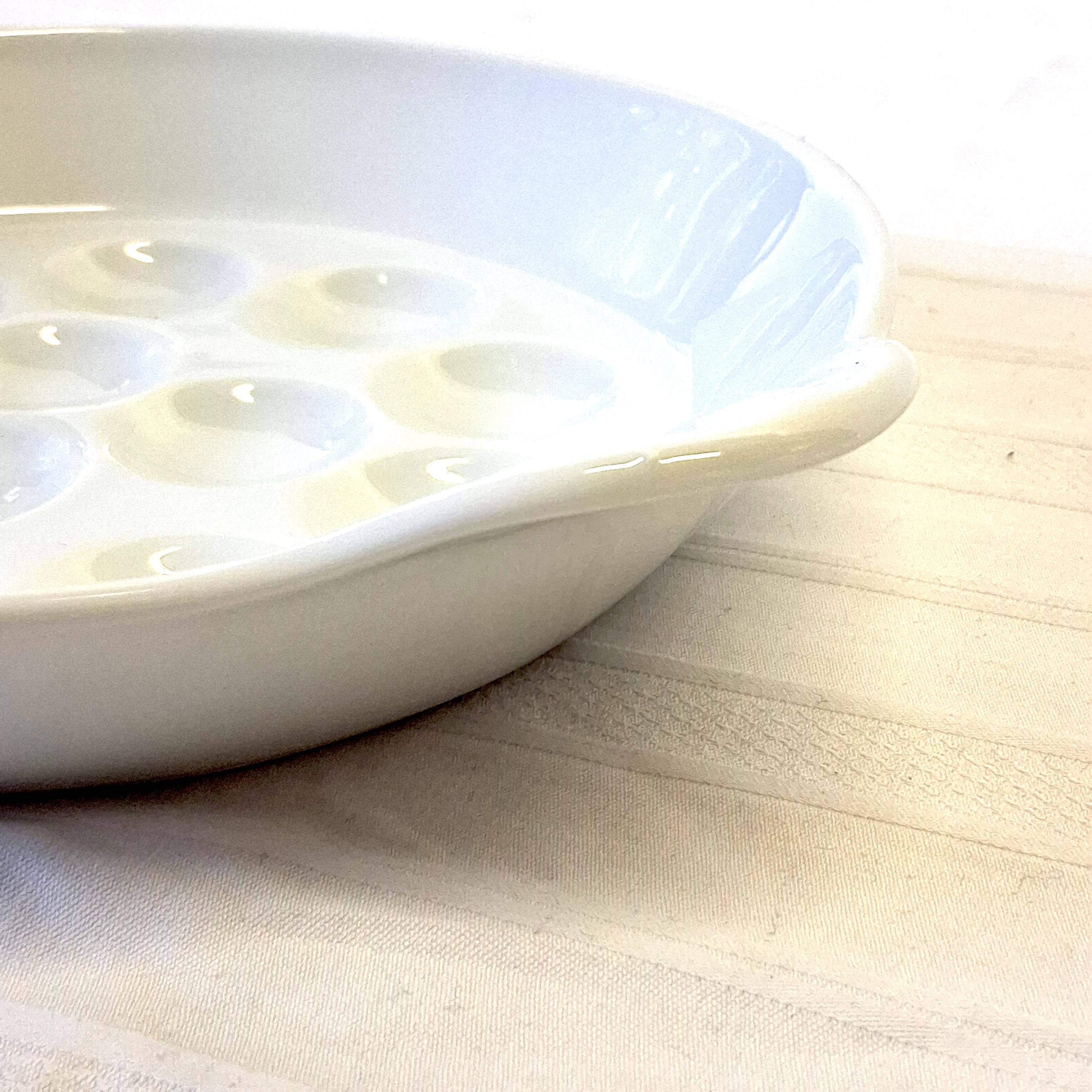 White Reussy porcelain snail dish in very good condition.