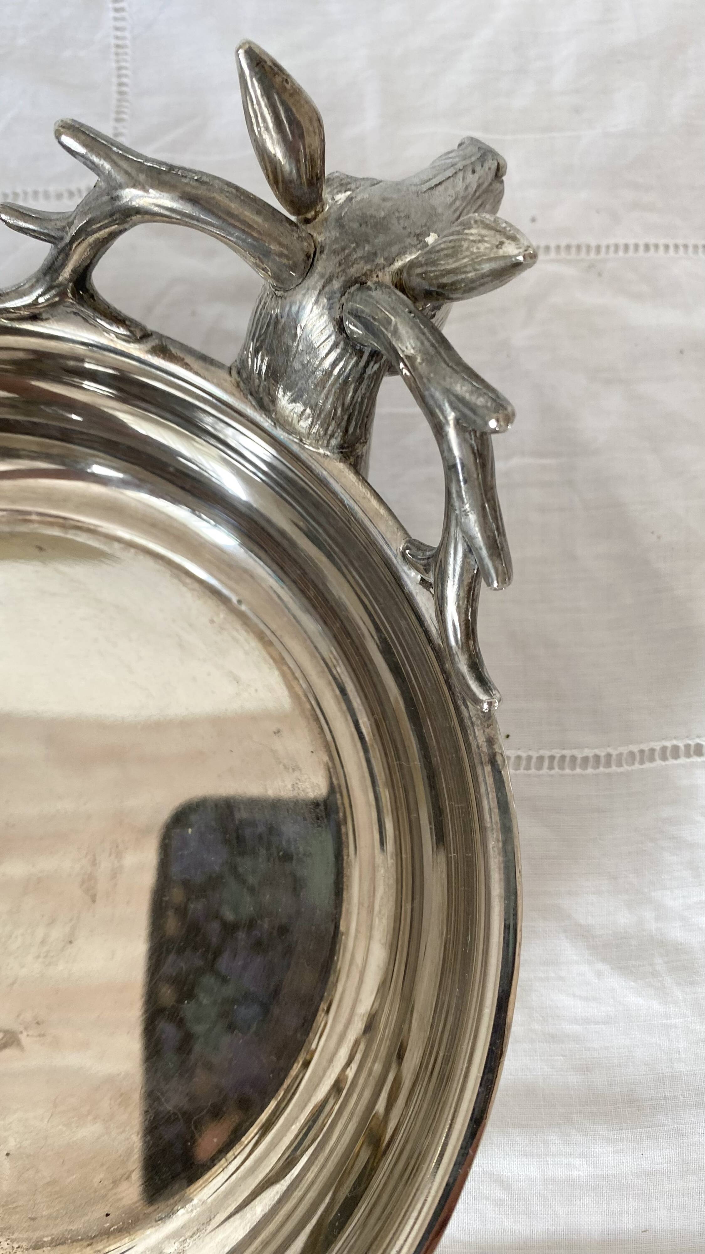 Silver plate with deer heads