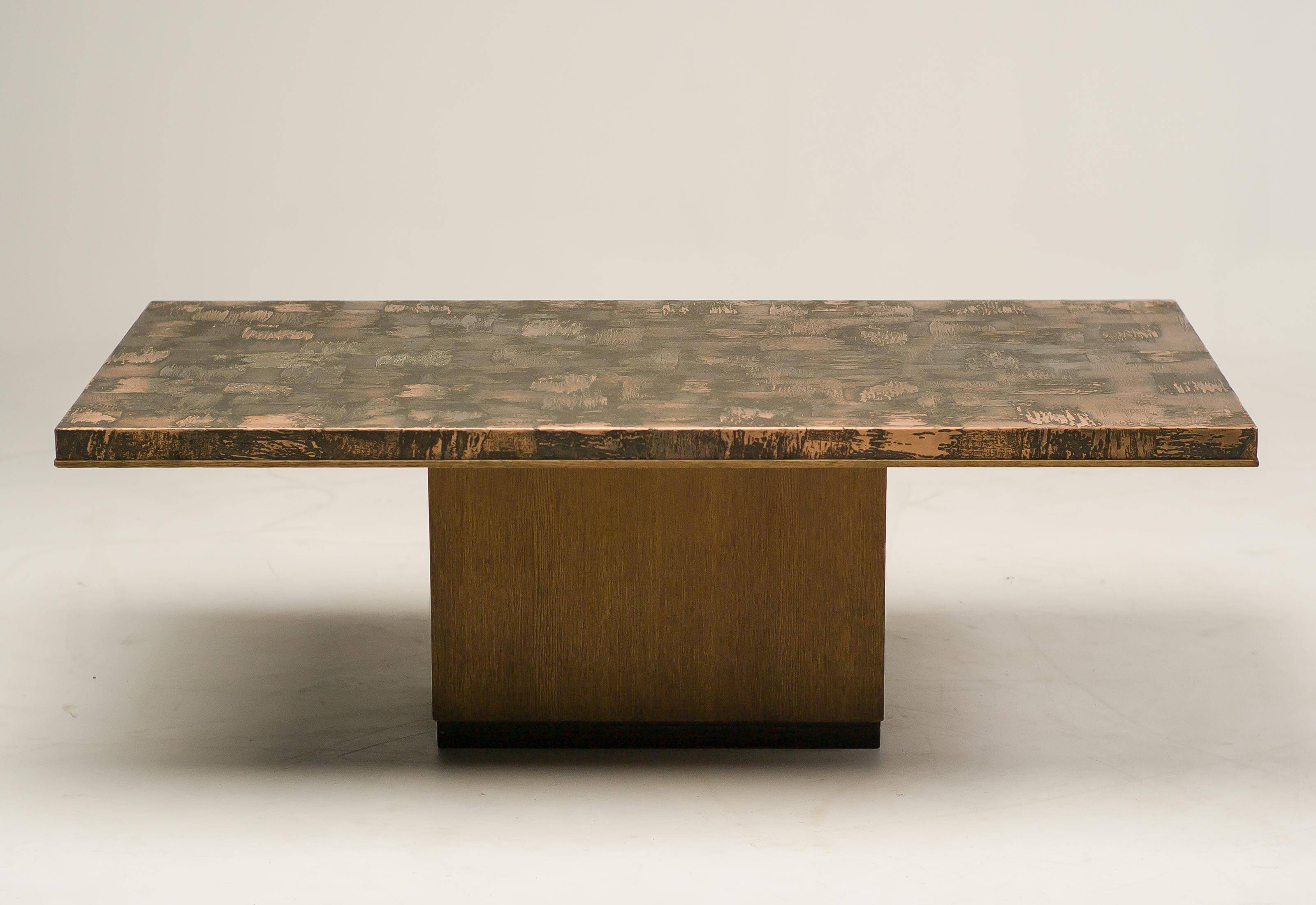 Coffee table with a pressed and engraved brass top by Illum Wikkelsø.