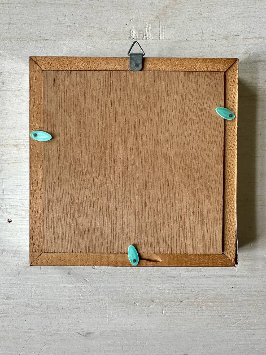 Stuffed butterfly in metal frame
