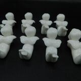 8 porcelain knife rests - Cherubs