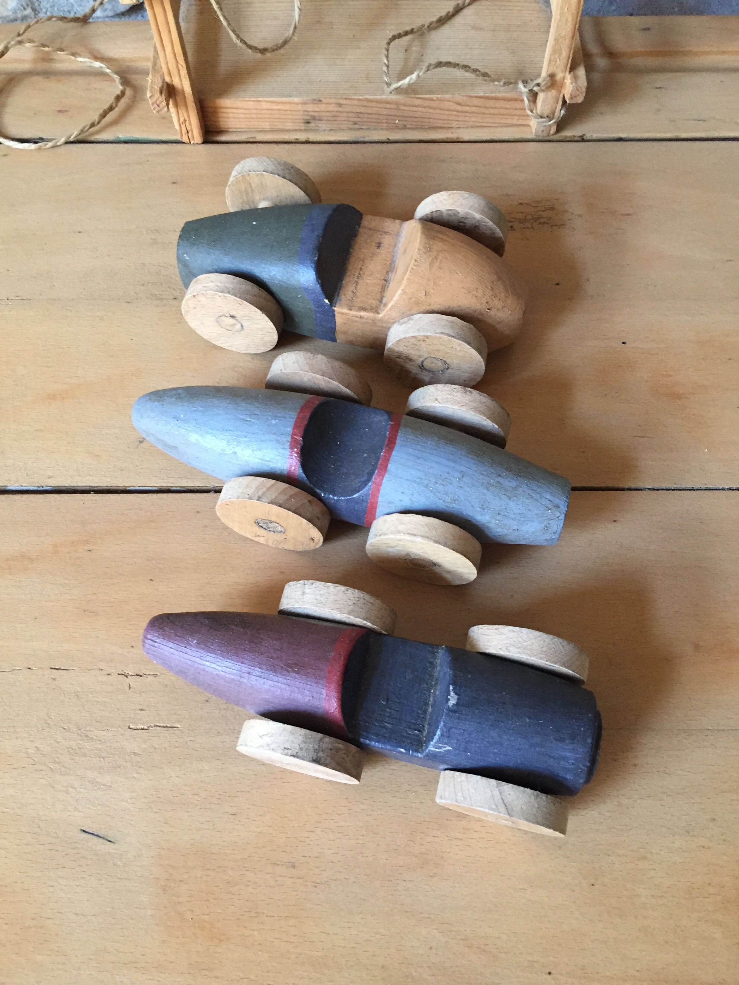 Three old wooden cars