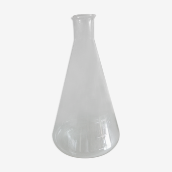 Old conical laboratory bottle