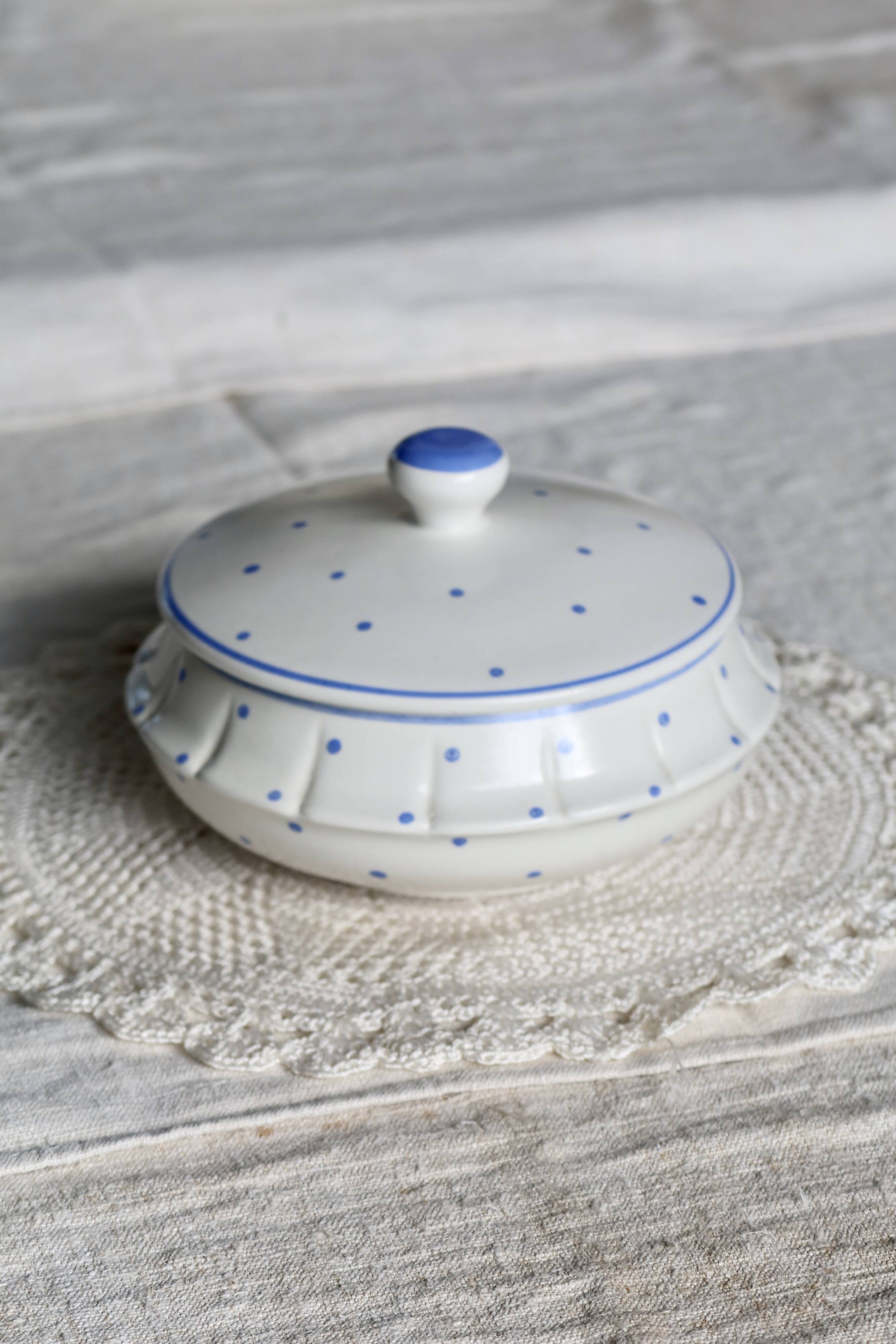 Vintage ivory earthenware candy box with blue polka dots