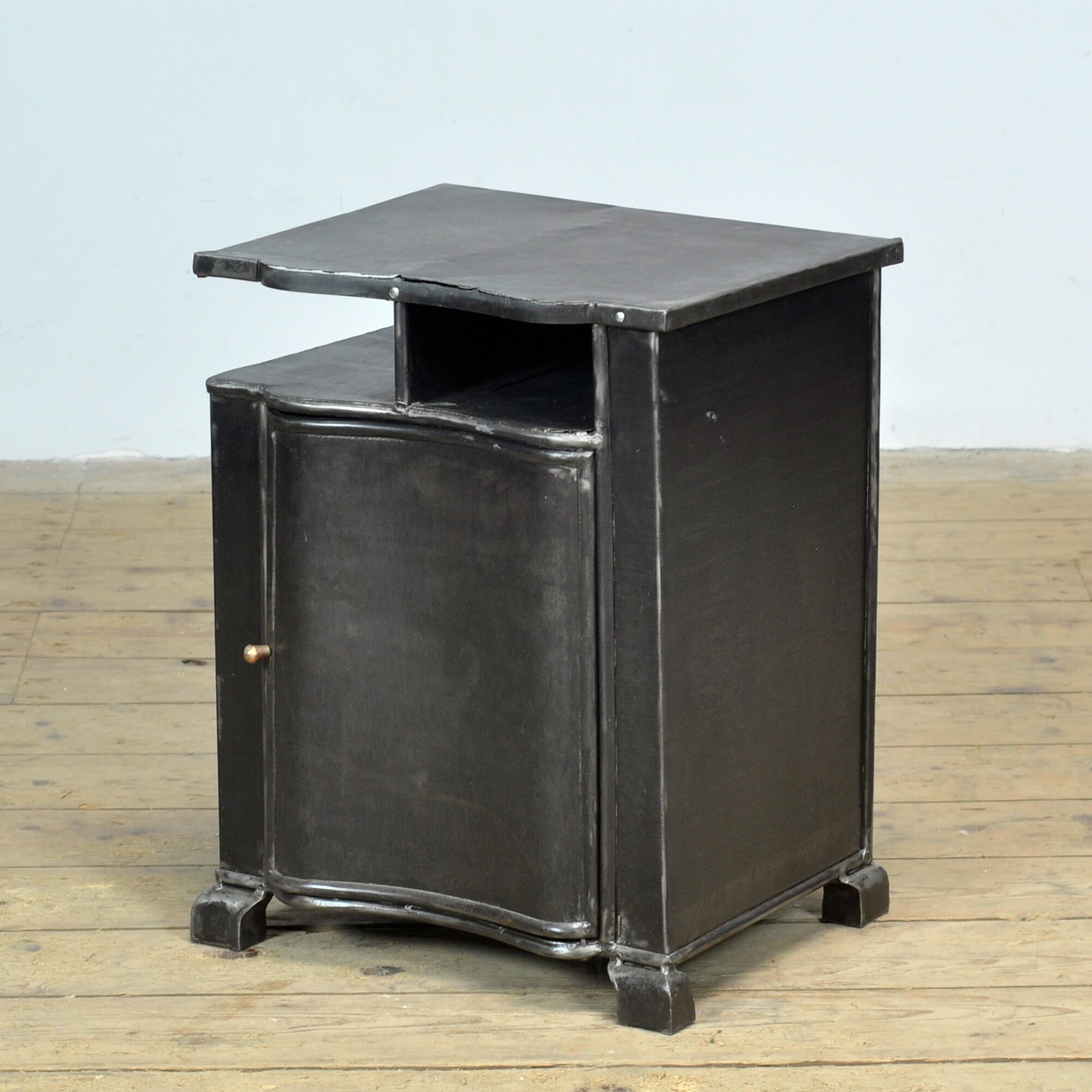 Iron bedside table, circa 1930