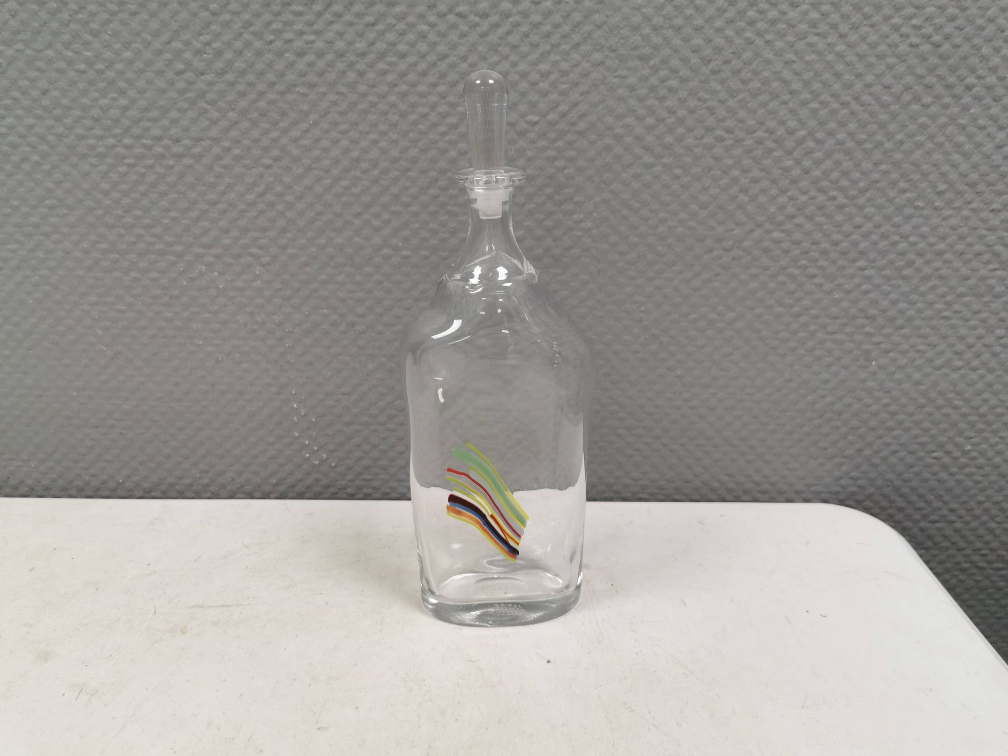 A  Bertil Vallien carafe with stopper for Kosta Boda, 1980s. Rainbow series