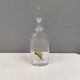 A  Bertil Vallien carafe with stopper for Kosta Boda, 1980s. Rainbow series