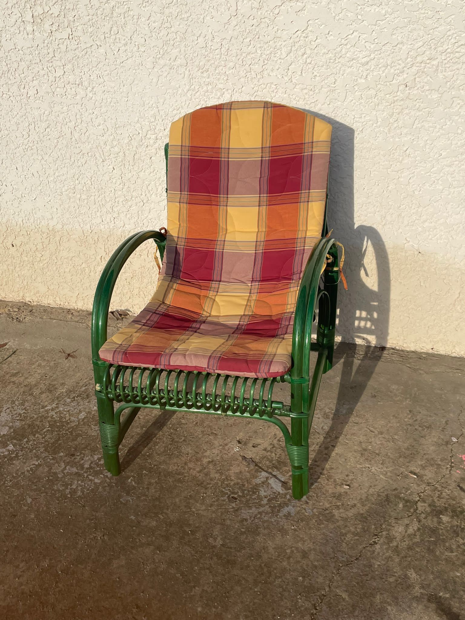 Green rattan armchair