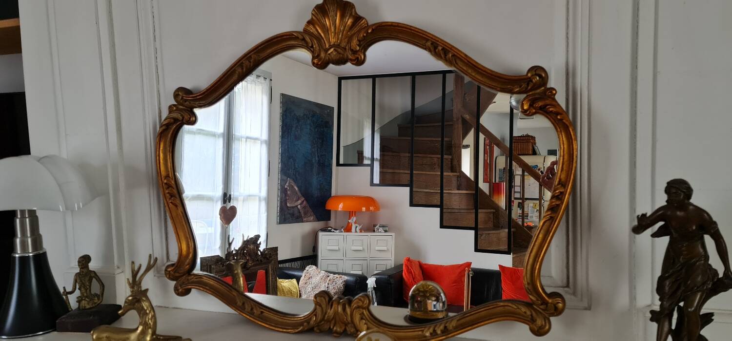 Antique mirror, 20th century, Louis XV style, gilded.