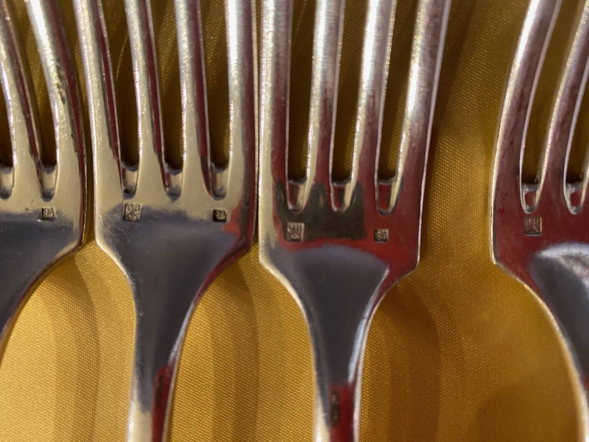 Series of 4 silver metal cutlery uniplat net model spoons forks