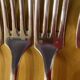 Series of 4 silver metal cutlery uniplat net model spoons forks