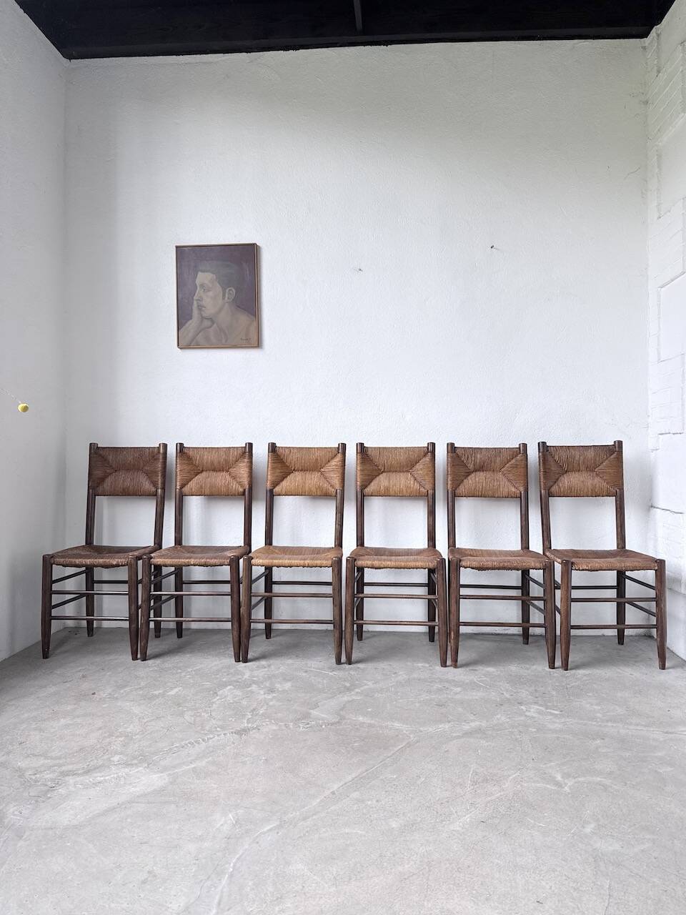 Set of 6 straw and oak Beauche chairs.