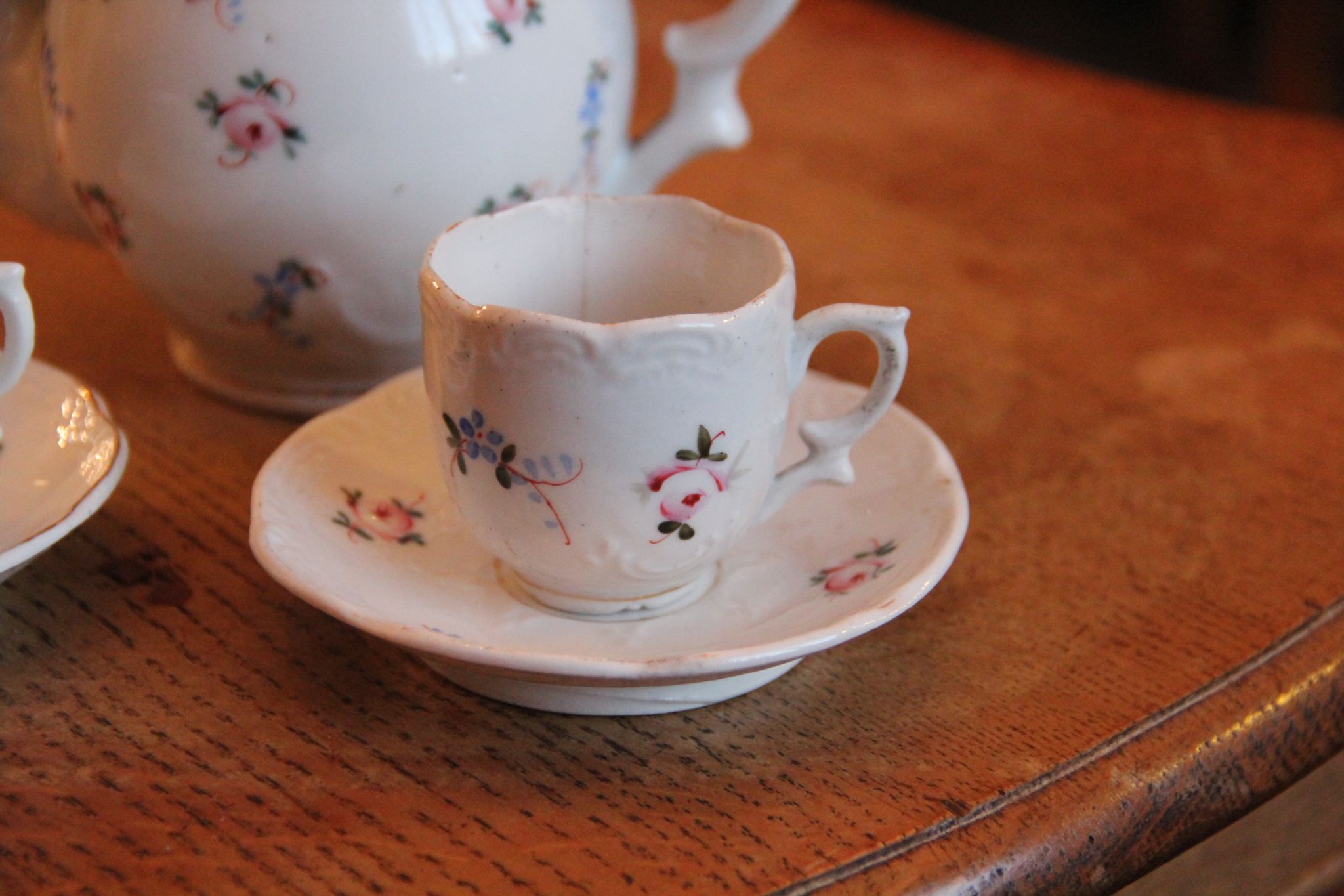 Hand-painted floral porcelain mocha service
