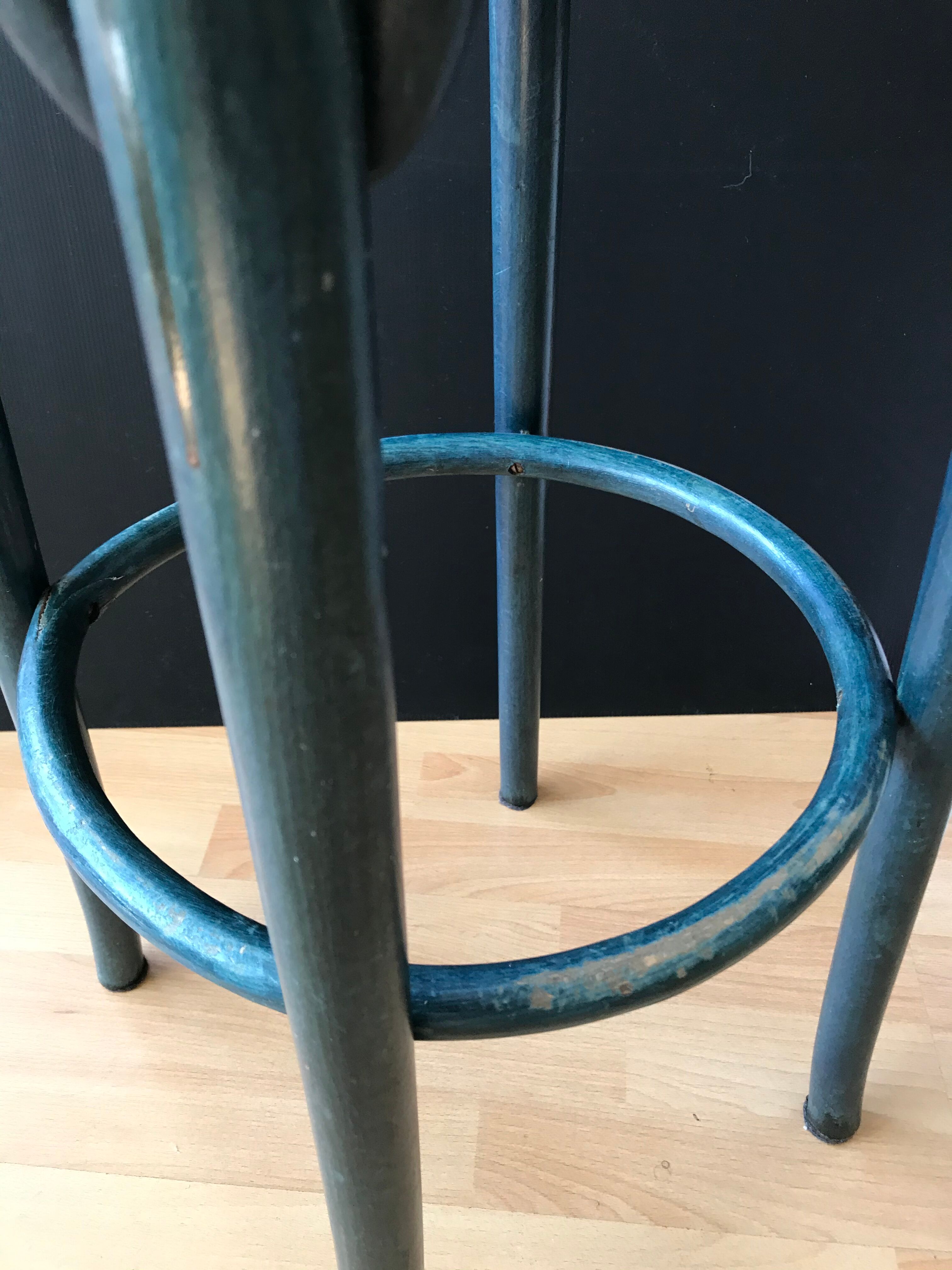 Curved wooden bar stool