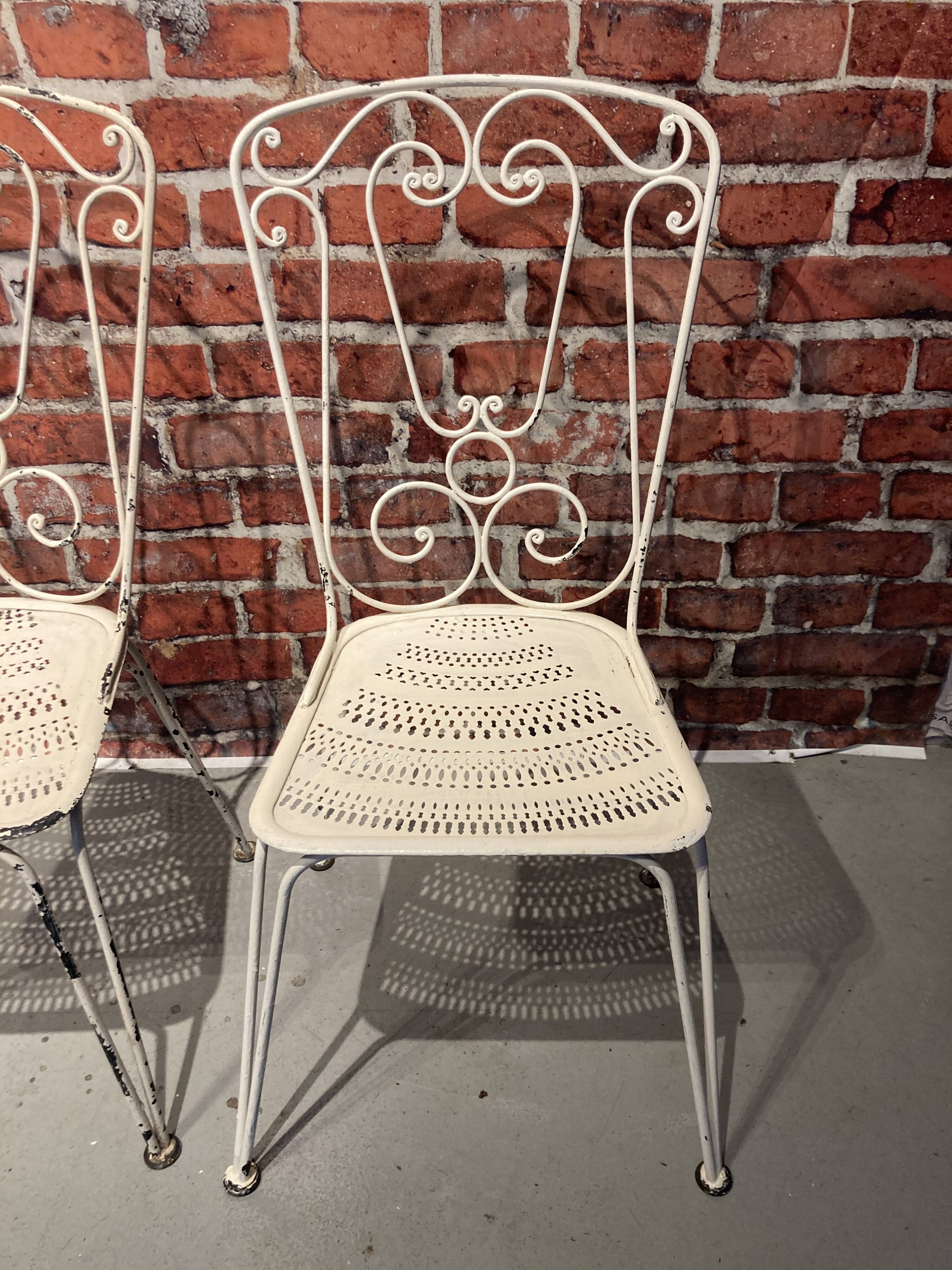 Wrought iron garden set painted white