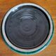 Dessous de plat vintage en céramique noire et verte