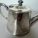 Silver-plated metal teapot vintage potter 240546